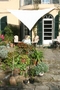 Sonnenschutz Gartenterrasse mit Dreiecksonnensegel Polyester